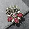 Broche retro de dos colores con forma de corona, elegante broche de ramillete de gemas de imitación combinables, estilo europeo y americano, para hombres y mujeres.