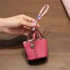 Nuevo Modelo 2026 Mini Bolso Cesta de Cuero en Múltiples Colores para Mujer, Accesorio Diario Ligero y Compacto, Almacenamiento para Auriculares