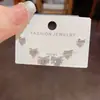 Estilo Nuevo de Verano Exquisito y Moderno Versátil Súper Brillante Lazo Circona Conjunto de Tres Piezas de Pendientes con un Toque de Lujo Ligero y de Gama Alta
