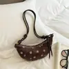 Bolso de Mano Tipo Bollo de Estilo Coreano Artístico de Lunares de Alto Valor 2026 Nuevo Bolso Cruzado Casual de un Solo Hombro Personalidad de Nicho Bolso Croissant