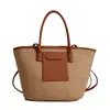 Suministrado directamente por el fabricante, bolso de hombro para mujer, bolso tejido hecho a mano vintage europeo y americano, bolso de paja, bolso de mano casual estilo vacacional para mujer