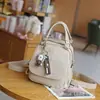 Modelo novo 2025 transfronteiriço pele de ovelha bege aveia estilo universitário original retrô simples bolsa transversal de ombro casual mochila