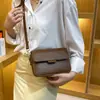 Bolsa Pequena de Textura Fashion Nicho Feminina 2022 Nova Popular Este Ano Bolsa Transversal de Cor Contrastante Elegante Versátil Bolsa Quadrada Pequena
