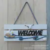 Tarjeta de bienvenida artesanal azul mediterráneo y blanco desgastado para listados, compañero de pared de fotos de bienvenida para listados de timonel
