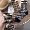 Calcetines altos para mujer ins de moda combinables cómodos estilo Estación Europea calcetines de felpa calcetines largos de algodón para mujer para otoño e invierno calcetines de algodón largos para mujer