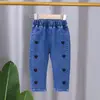 2026 Novo Estilo Coreano Primavera e Outono Calça Jeans Longa para Meninas Roupa de Primavera e Outono para Crianças Calça Solta Estilosa para Bebê