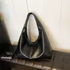 Bolsa de Ombro Vintage de Nicho para Mulheres 2026 Nova Tendência Versão Coreana Bolsa Tote Casual Versátil de Grande Capacidade