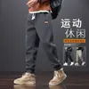 Calças Casuais Masculinas 2026 Outono/Inverno Novo Corte Solto Estilo Jogger Tendência Forrado com Fleece Estilo Coreano Versátil Calças Esportivas