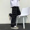 Calças cargo masculinas multi-bolsos, estilo ins de Hong Kong da moda, calças compridas casuais de perna reta soltas, calças jogger cool de cordão de rua