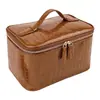 Set de tres piezas de bolsa de maquillaje con patrón de cocodrilo transfronterizo, impermeable, lujo ligero, gran capacidad, alta gama, bolsa de tocador de viaje conveniente