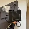 Bolsos de Mujer de Gama Alta de Nicho 2026 Nuevo Versátil Casual Bolso Cruzado para Mujer Súper Popular Bolso Cubo de Hombro