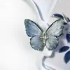 Tiktok mismo estilo super hada retro corte court clip lateral mariposa azul gris hielo pasador tocado clip de pico de pato accesorios brillantes de temperamento