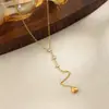 Joyería transfronteriza europea y americana, collar con colgante de corazón en forma de Y de acero inoxidable minimalista, collar con borla de diamante brillante de circón de lujo ligero
