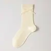 Meias para mulheres, primavera e verão, finas, de trama aberta, vazadas, casuais, versáteis, doces, para meninas, com laço, meias largas, sem costura, meias altas