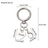 Llavero colgante retro de aleación del Árbol de la Vida con trébol de la suerte y letra, accesorio para mochila, superventas transfronterizo de Amazon