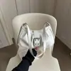 Bolsa plissada retrô de nicho para mulheres, versão coreana, nova moda versátil 2026, bolsa de ombro/axila, bolsa de mão elegante