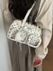 Bolso de hombro y axila de lunares de moda transfronteriza de nicho para mujer, nuevo bolso de mano para commuting 2026, bolso Boston, bolso almohada