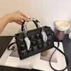 Bolso cuadrado pequeño, simple, moderno y único, bolso de hombro nuevo y de moda con textura, bolso cruzado simple de estilo coreano para mujer, verano 2026