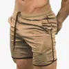 Cross-border Muscle Fitness Masculino Shorts Esportivos Malha Fina Quick-drying Casual Running Training Respirável Calças de praia respiráveis