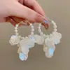 Pendientes de Perla en Forma de Pétalo de Moda de Lujo Ligero Estilo Francés con un Diseño Súper de Hada, Brazaletes Largos con Borlas, Exquisitos Pendientes de Aro Versátiles