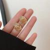 Aretes de cristal de champán de alta gama de nicho de mar naranja 2023 nuevos aretes de moda aretes de diseño exquisito