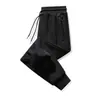 Pantalones Deportivos de Algodón Puro Estilo Nuevo para Hombre, Pantalones Casuales, Versátiles de Otoño 2026, Holgados, Rectos, Largos, para Hombre