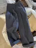 Pantalones grises de diseño nicho estilo coreano de alta gama 2026 para mujer otoño vintage de cintura alta adelgazantes plisados con dobladillo enrollado pantalones de traje