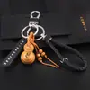 Doce Signos del Zodiaco Calabaza de Madera de Durazno con Llavero de Barra de Oro Hebilla de Cinturón de Cuero Colgante de la Suerte Zodiacal Regalo de Negocios
