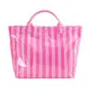 Bolso de mano de PVC a rayas transfronterizo nuevo, bolso de mano elegante y ligero, bolso de hombro portátil de gran capacidad para viajes