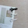 Accesorios creativos de llave inglesa transfronterizos europeos y americanos, clips para el pelo laterales sin costuras de pegamento de crema DIY para niñas, pinzas de pelo de pico de pato, llaveros