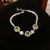 Pulsera redonda de flor de circón transfronteriza europea y americana, diseño de nicho exquisito, lujo ligero, sensación de alta gama, accesorio de mano versátil
