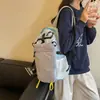 Mochila Coreana de Bloques de Color de Nicho para Mujer 2026 Nueva Mochila Pequeña Casual para Estudiantes Viajes Mochila de Montañismo Escolar con un Toque de Alta Gama