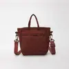 Bolsa de mão moderna 2026, bolsa de ombro simples, superfície macia e leve, adequada para uso ao ar livre, deslocamento de verão, nova bolsa transversal tipo balde para mulheres