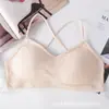 Sujetador deportivo sin costuras con tirantes cruzados en la espalda, con aros sin acero y almohadilla para el pecho, ideal para mujer.