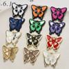 Diablo retro creativo color de goteo de aceite mariposa cinturón colgante aleación accesorios diy aretes colgante de pelo material al por mayor