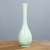 Botella de porcelana blanca Botella Guanyin tamaño pequeño jarrón de cerámica blanca celadón para Buda boca fina botella de red de jade ceremonia del té hotel tour