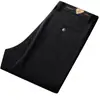 Calça masculina de veludo cotelê para outono e inverno com LOGO personalizado, forrada com fleece e espessa, cintura alta, corte solto, perna reta, calça casual de veludo cotelê