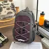 Mochila transfronteiriça de alto valor estético, novo design vibrante color-blocking, mochila de grande capacidade para esportes ao ar livre e montanhismo para casais
