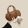 2026 Bolso de Mano Versátil de Nueva Moda Bolso Estilo Bowling Diseño de Nicho para Viajes Diarios y Uso al Aire Libre Bolso Pequeño de Hombro Cruzado