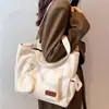 Bolsa de lona tipo tote para estudiantes universitarias, versátil y de gran capacidad, adecuada para ir al trabajo y llevar libros a clase, con cierre.
