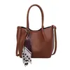 Colección Otoño 2026: Bolso tote de gran capacidad, elegante y minimalista para el día a día, diseñado para mujeres con una estética única y moderna, adecuado para llevar al hombro o cruzado.