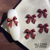 Nuevos accesorios de arte de uñas con pintura en aerosol de aleación, accesorios de arte de uñas de la suerte de Año Nuevo rojo de otoño e invierno, lazos huecos conjoined