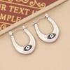 Europa y Estados Unidos nuevos aretes de ojos de aceite de gota de joyería aretes geométricos de acero inoxidable aretes de marea de personalidad E492