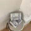 Bolso de cadena para mujer, versión coreana, nuevo de moda verano 2026, bolso cuadrado pequeño casual con personalidad, bolso cruzado de hombro simple de moda