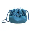 Bolso tipo cubo con flecos estilo coreano para mujer, nueva colección otoño/invierno 2026, acabado mate, bolso de hombro, bolso cruzado, diseño de alta gama, bolso de cordón de nicho