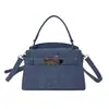 Bolsa de Ombro de Alta Costura Estilo Coreano para Mulheres 2026 Nova Coleção de Primavera Bolsa Kelly Bolsa Transversal Quadrada Pequena Simples