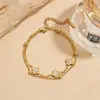 Pulsera de Acero de Titanio con Trébol de Cuatro Hojas de Nácar de Doble Capa, Superventas Transfronteriza, Pulsera Popular de Lujo Ligero para Mujer, Joyería Elegante para la Mano