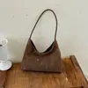 Nuevo diseño nicho bolsa de lona de pana retro simple y moderna bolsa de hombro gran capacidad bolsa de tela para estudiantes