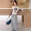 Conjunto de Camiseta Base Rayada de Dibujos Animados para Niñas 2026 Primavera y Otoño Nuevo Conjunto de Dos Piezas de Moda con Camiseta Falsa de Dos Piezas y Pantalones de Pierna Ancha