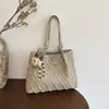 Bolso de mano simple para mujer 2026 nuevo modelo, lindo bolso tote para mujer, bolso de hombro para commuting de nicho de gran capacidad, bolso de mano versátil